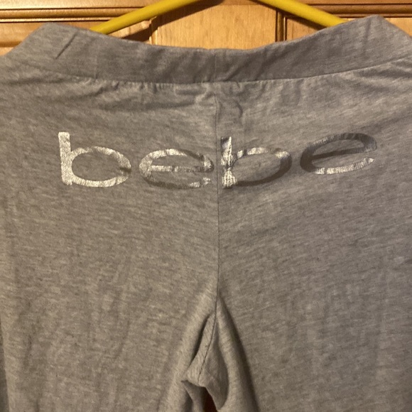 bebe sweatpants… Gray with velour stipe on side of legs / Velour tie at waist . - Picture 2 of 8